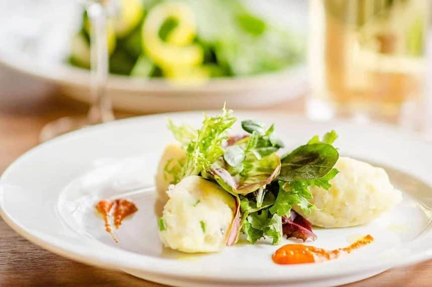 Gourmet Smoked Cod Brandade on a White Plate