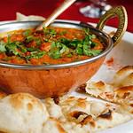Calgary fine dining Indian cuisine with naan bread.