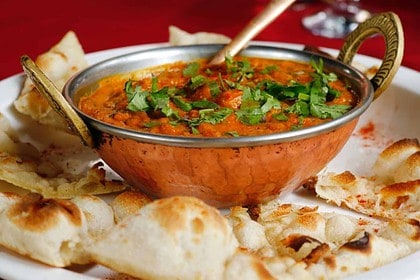 Calgary fine dining Indian cuisine with naan bread.