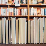 Rows of books on library shelves.