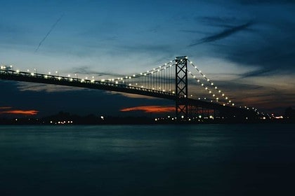 Evening view of Windsor Bridge with lights.