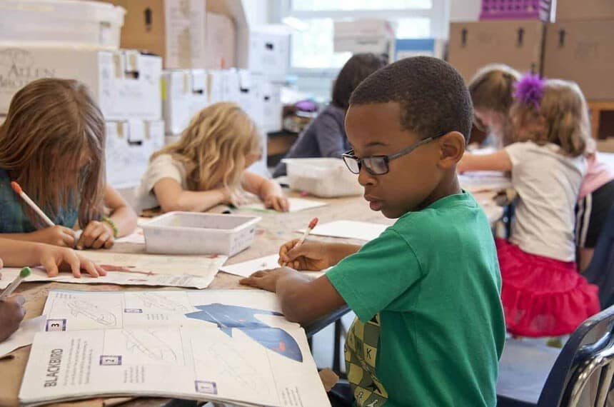 Canadian elementary school students engaged in classroom activities.