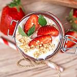 Fresh strawberry quinoa smoothie garnished with mint.