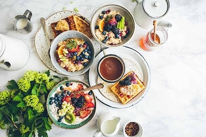 Delicious brunch selection with fresh berries and waffles.