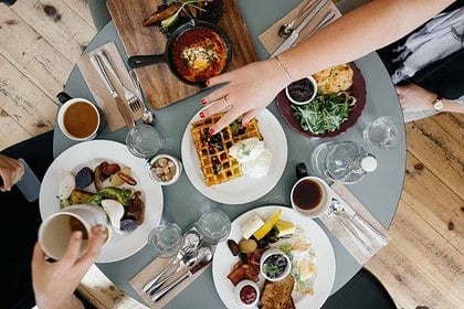 Top view of a cozy brunch spread at a mountain restaurant.