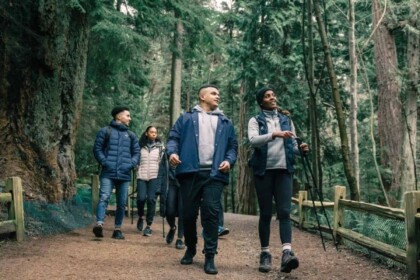 Group of hikers on a forest trail adventure.