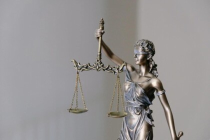 Lady Justice statue symbolizing legal fairness.