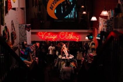Cozy Montreal vintage clothing store with neon sign.