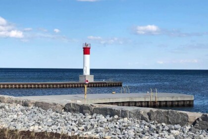 Scenic Oakville waterfront with lighthouse view.