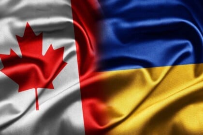 Canadian and Ukrainian flags symbolizing bilateral support.
