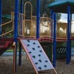 Colorful playground equipment at Churchill Park, Cambridge.