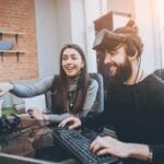 Couple enjoying gaming together at home
