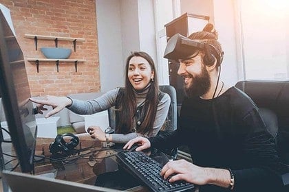 Couple enjoying gaming together at home