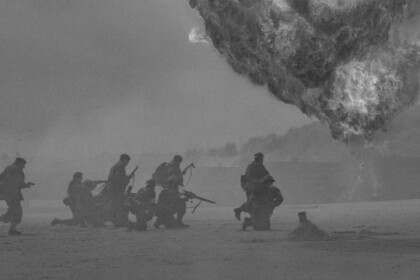 Historical military reenactment with explosion effect