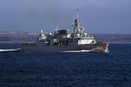 HMCS Charlottetown naval ship at sea, representing Canadian Navy.