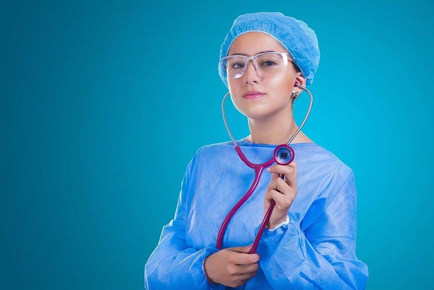 Confident female surgeon with stethoscope.