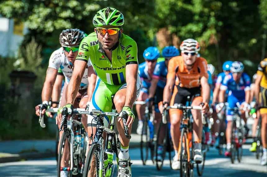 Cyclists competing in road racing event.