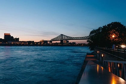 Twilight over Montreals iconic bridge and waterfront.