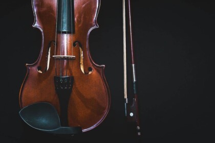 Elegant Violin on Dark Background for Beatles Tribute Event