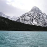 Majestic Alberta mountainscape with turquoise river.