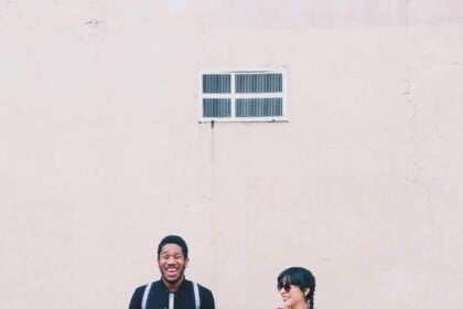 Fashionable couple posing on London street.