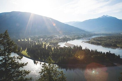 Scenic view of Revelstoke Golf Course with mountains.