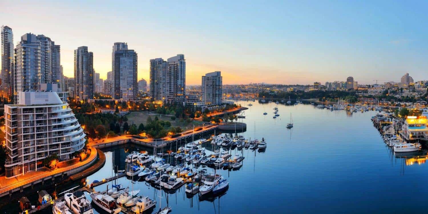 Sunset view of Vancouver skyline and marina, British Columbia.