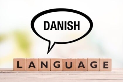 Sign and blocks displaying Danish Language learning concept.
