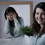 Woman reflecting on bipolar disorder experiences.