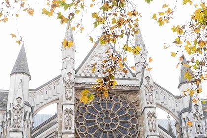 Gothic church architecture with autumn leaves
