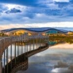 Scenic view of Calgarys pedestrian bridge and reflections.