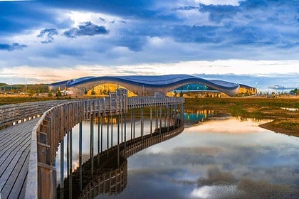 Scenic view of Calgarys pedestrian bridge and reflections.