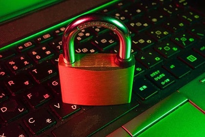 Cybersecurity concept with padlock on keyboard