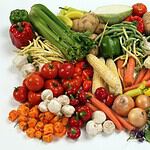Assorted fresh vegetables on a white background.