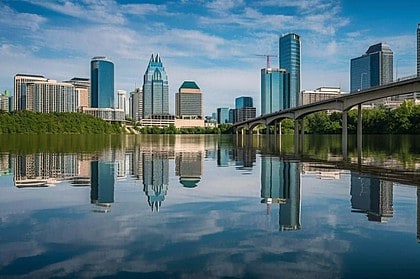 Montreal skyline and its reflection on water.