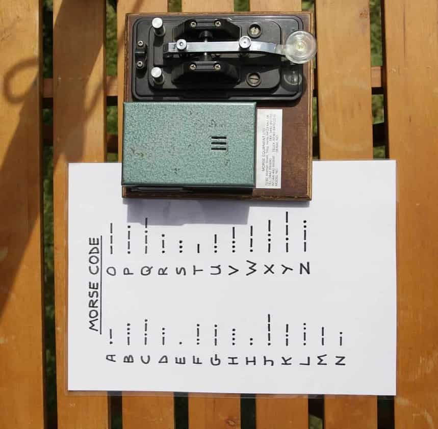Morse code transmitter and alphabet guide for learning.