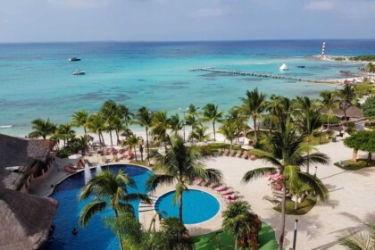 Idyllic Cancun Resort with Turquoise Waters and Palm Trees