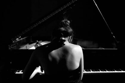 Pianist performing Fleetwood Mac tribute by candlelight in Toronto.
