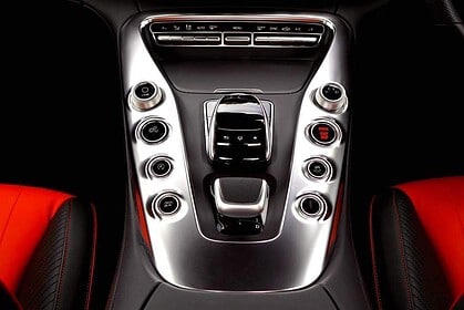 Luxury car interior with manual transmission.