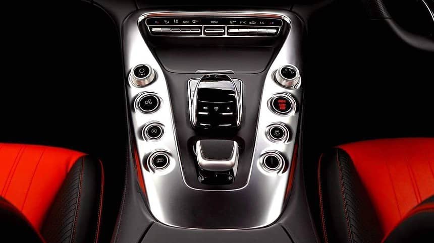 Luxury car interior with manual transmission.