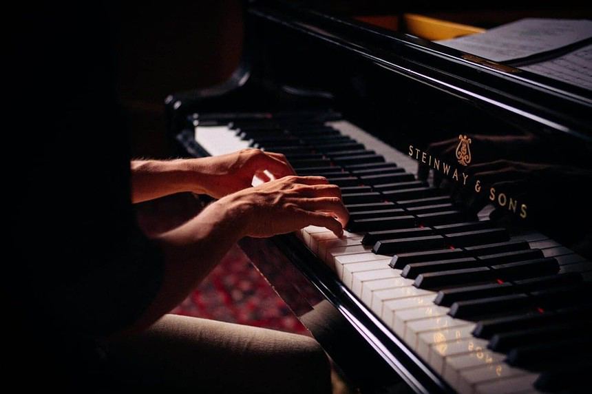Pianist performing at a live soundtrack event in Toronto.