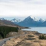 Breathtaking mountain range beside a serene lake.