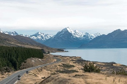 Breathtaking mountain range beside a serene lake.