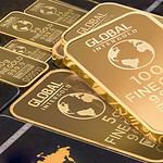 Stack of fine gold bullion bars.