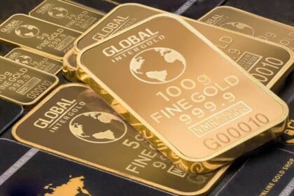 Stack of fine gold bullion bars.