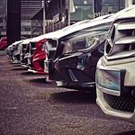 Row of parked Mercedes-Benz vehicles