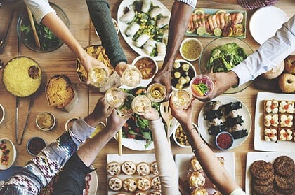 Group of friends enjoying a shared meal together.