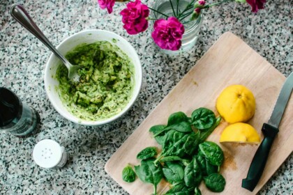 Making fresh spinach pesto with lemons and herbs.