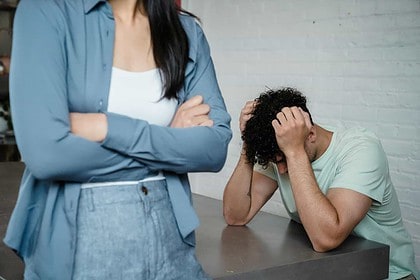 Person comforting another during a mental health crisis.