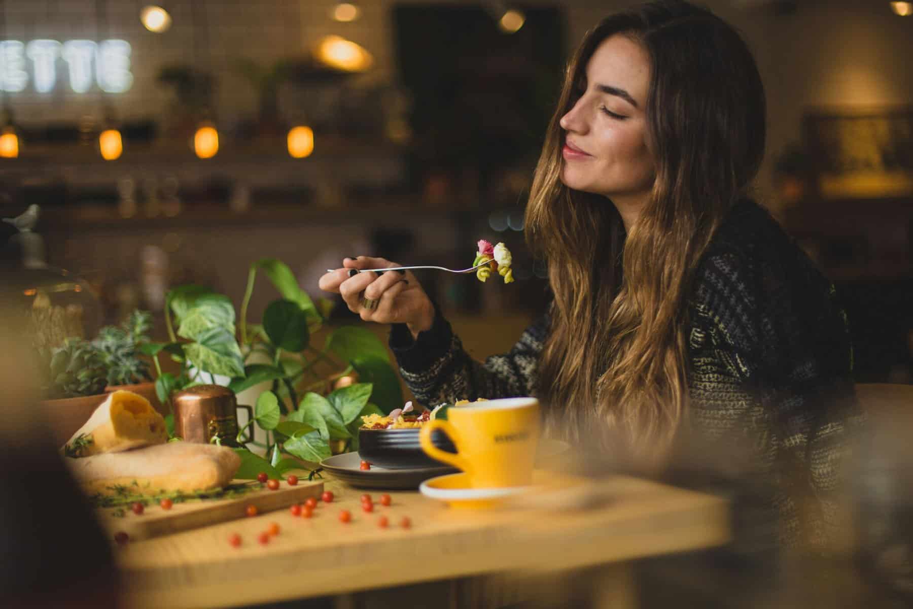 girl enjoying dinner